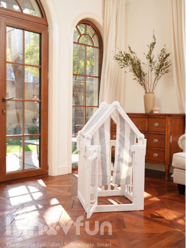 White Innovfun puppy playpen with A-frame tent and striped fabric panels in a living room